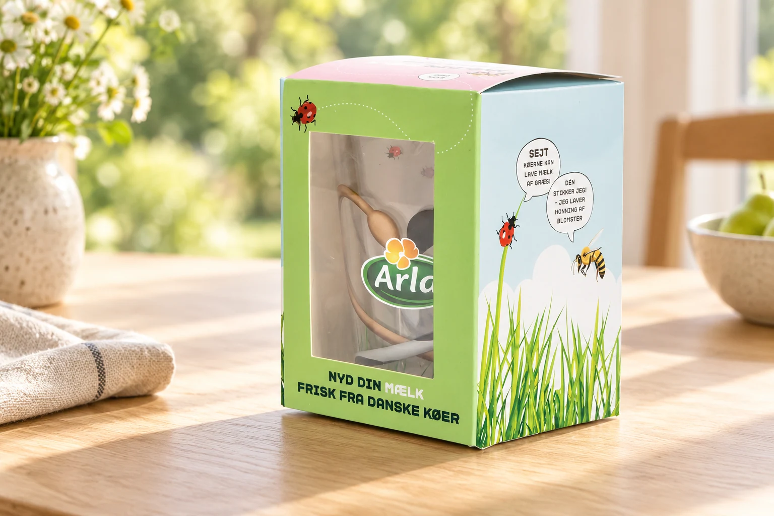 Lifestylemockup af Yverglas emballagen med vindue og illustrationer